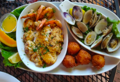 Tony's Restaurant signature dishes Garden Salad With Grilled Shrimp Skewer
Tony's Chowder House Platter
Fried Chicken Strips